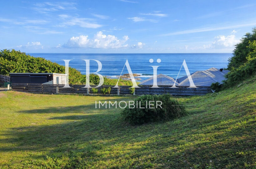 Agence IBAIA Immobilier - LE MOULE - TERRAIN CONSTRUCTIBLE - VUE MER