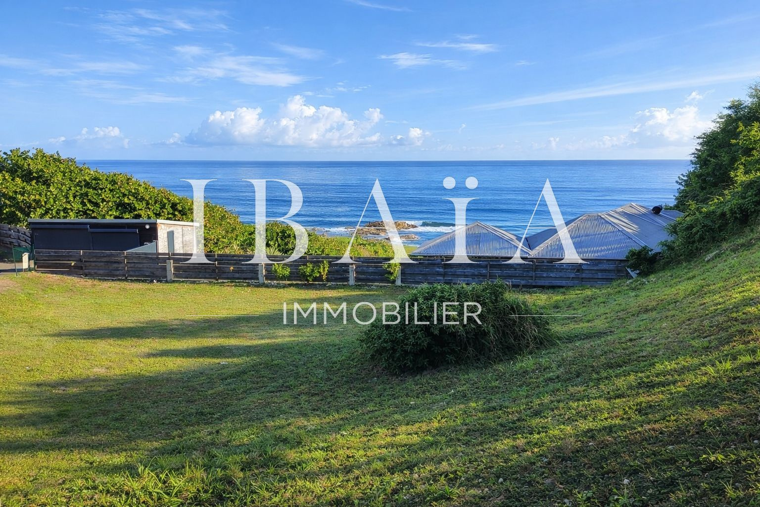Agence IBAIA Immobilier - LE MOULE - TERRAIN CONSTRUCTIBLE - VUE MER
