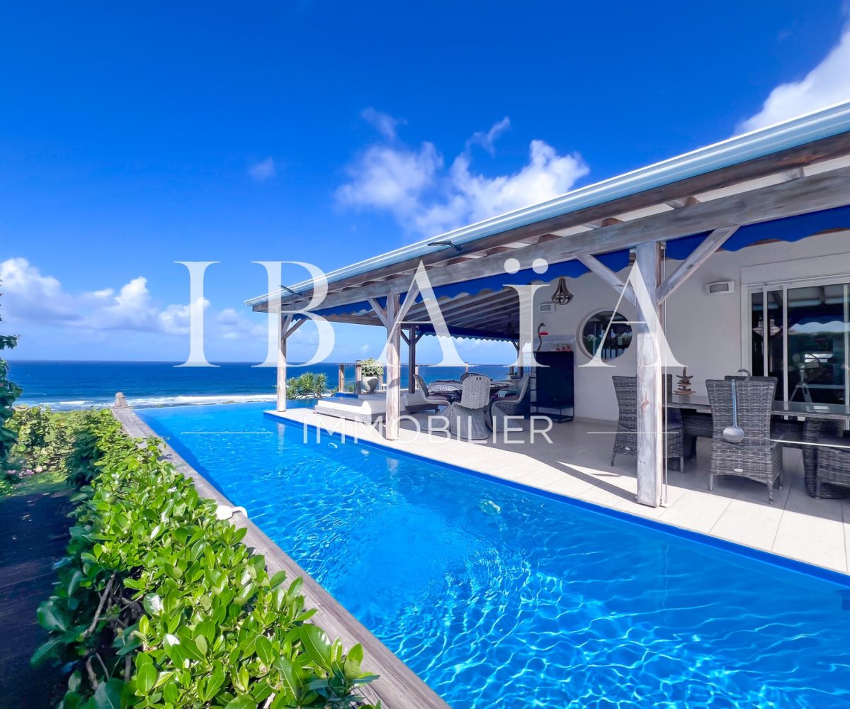 Agence IBAIA Immobilier - LE MOULE - VILLA BÉNÉFICIANT D'UNE VUE MER EXCEPTIONNELLE
